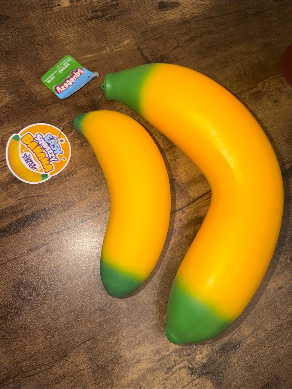 TWO 2 Squishies Bananas One Giant Squeezy & One baby orb Squeezy